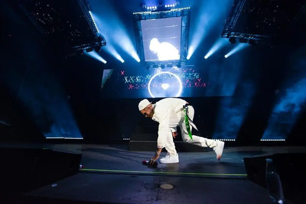 Sfera Ebbasta outfit in Kenzo, Nike, and New Era, 2023