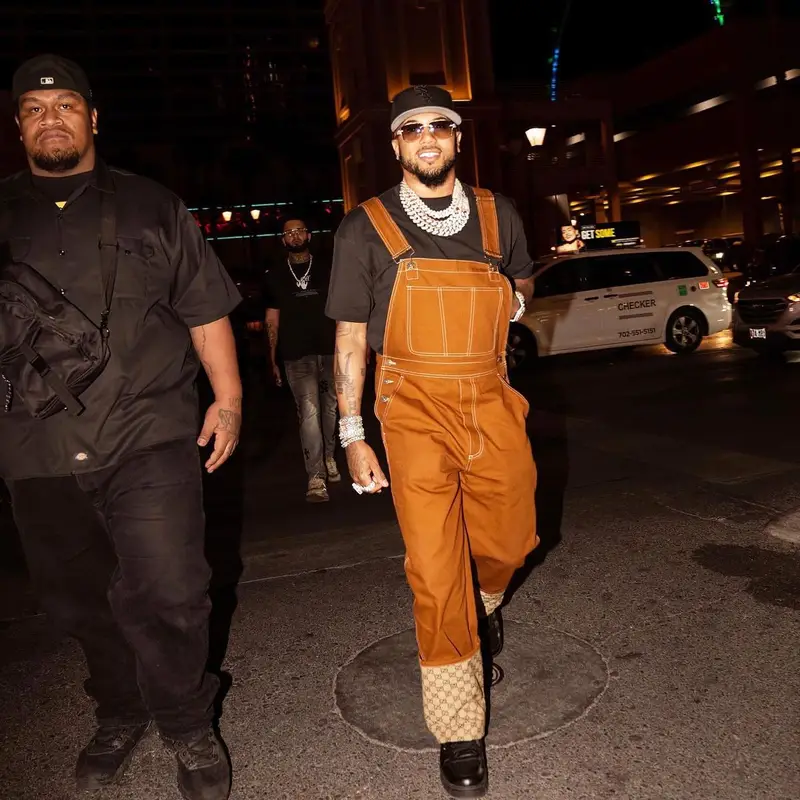 Mazi Vs outfit in Cartier, New Era, and Gucci, 2023