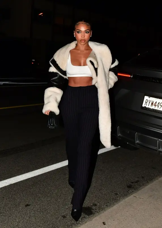 Lori Harvey outfit in Balenciaga, Amina Muaddi, and Bottega Veneta, 2023