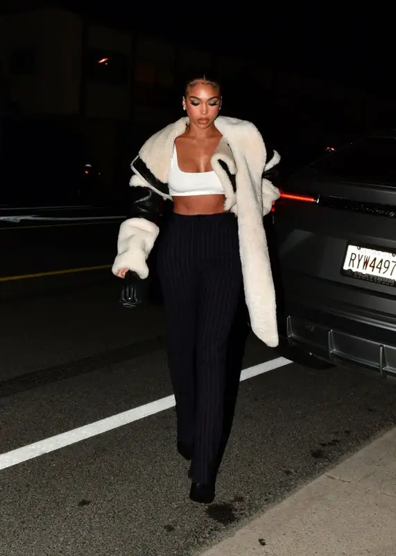 Lori Harvey outfit in Balenciaga, Amina Muaddi, and Bottega Veneta, 2023
