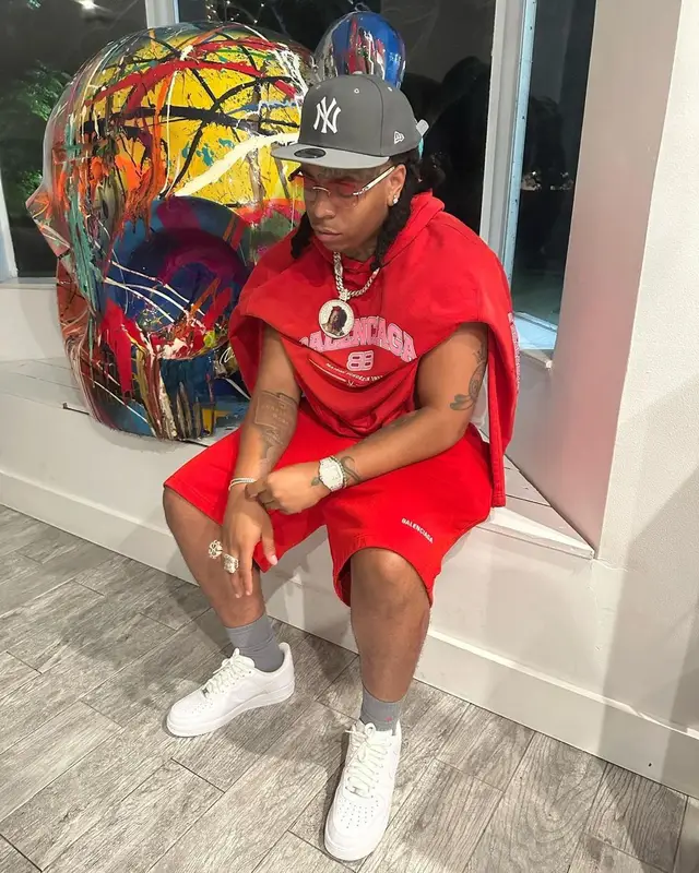 Lil Gotit outfit in Balenciaga, Cartier, and New Era, 2023