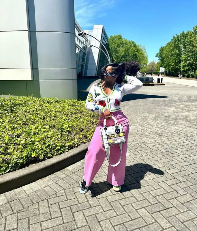 Reginae Carter outfit in Nike, Dior, and Bottega Veneta, 2023