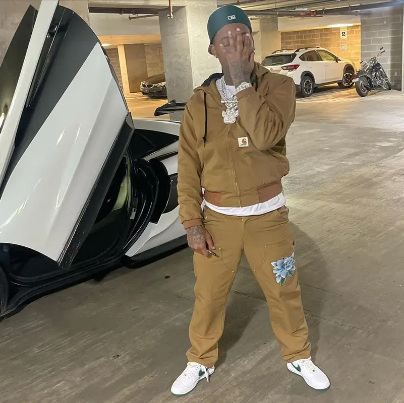 21 Lil Harold outfit in Carhartt, Nike, and Awake NY, 2023