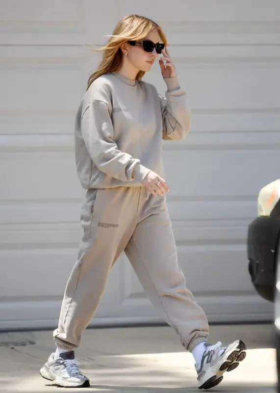 Sydney Sweeney outfit in Pangaia, New Balance, and Miu Miu, 2023