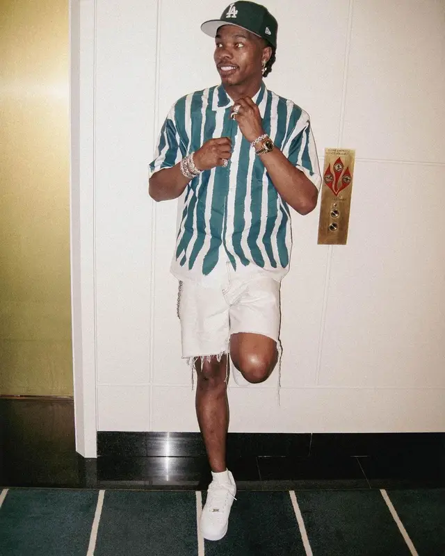 Lil Baby outfit in Marni, Saint Laurent, and New Era, 2023