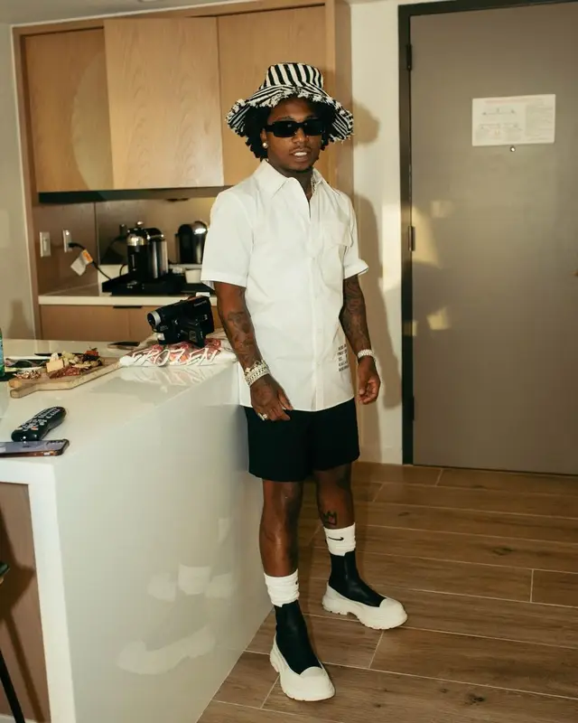 Jacquees outfit in Helmut Lang, Anthropologie, and Nike, 2023