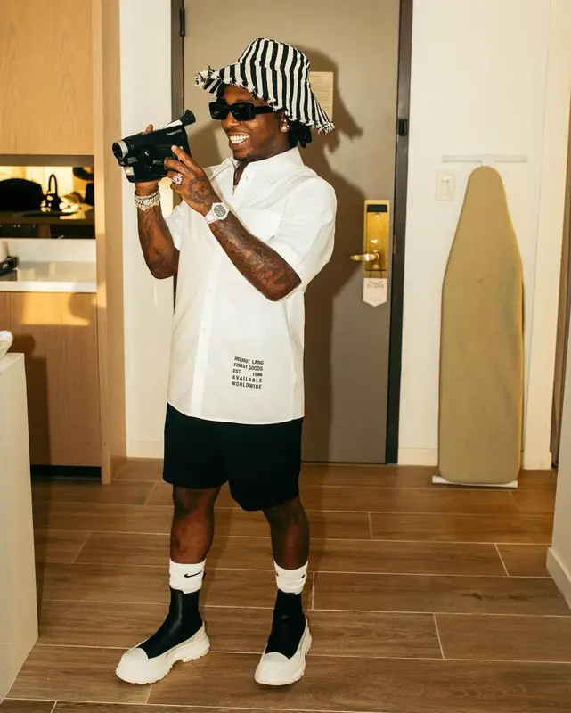 Jacquees outfit in Helmut Lang, Anthropologie, and Nike, 2023