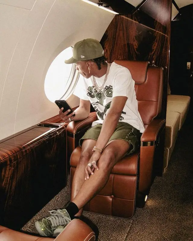Lil Baby outfit in Celine, Nike, and New Era, 2023