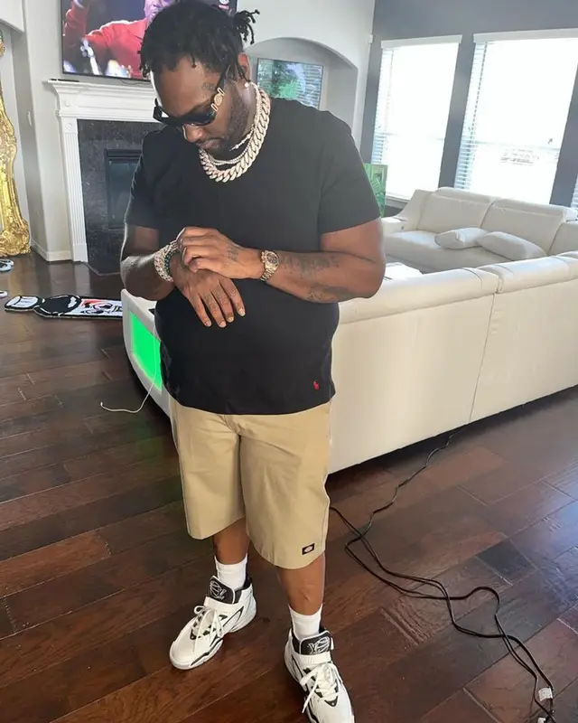 Peezy outfit in Polo Ralph Lauren, Dickies, and Versace, 2023