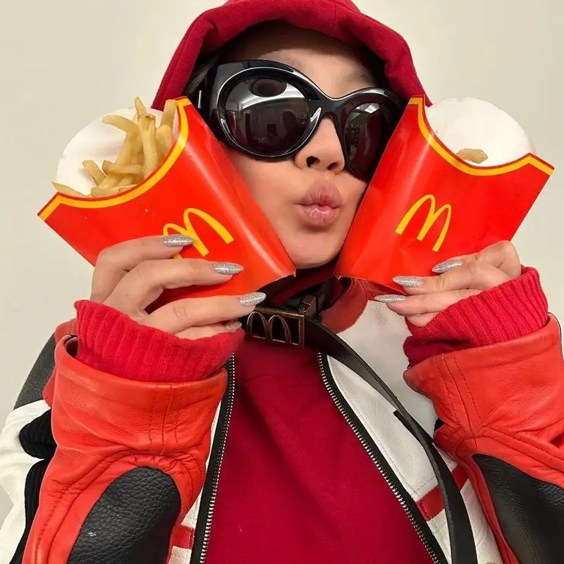 Coi Leray outfit in McDonald's Merch and Jimi Vain, 2023