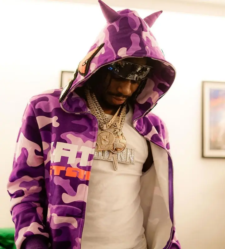 Russ Millions outfit in Amiri, Jordan, and Louis Vuitton, 2023