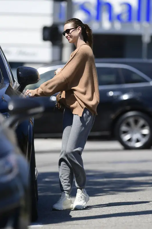 Whitney Port-Rosenman outfit in Axel Arigato, 2022