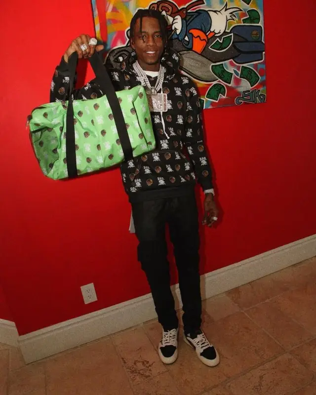 Soulja Boy outfit in Soulja Boy Merch, Amiri, and Nike, 2023