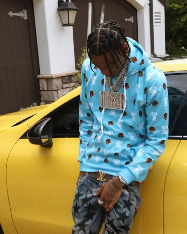 Soulja Boy outfit in Soulja Boy Merch, Amiri, and Louis Vuitton, 2023