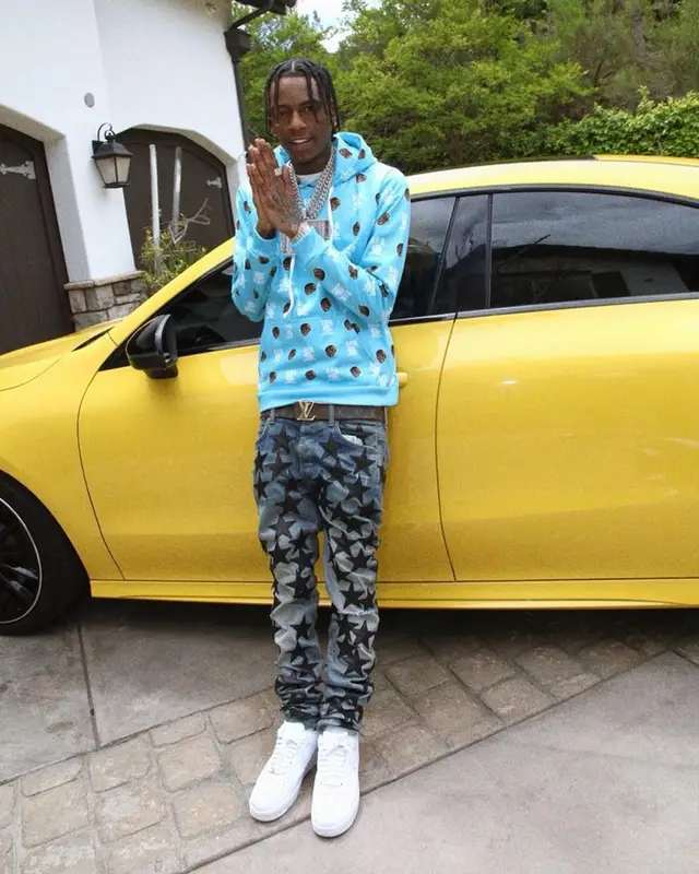 Soulja Boy outfit in Soulja Boy Merch, Amiri, and Louis Vuitton, 2023