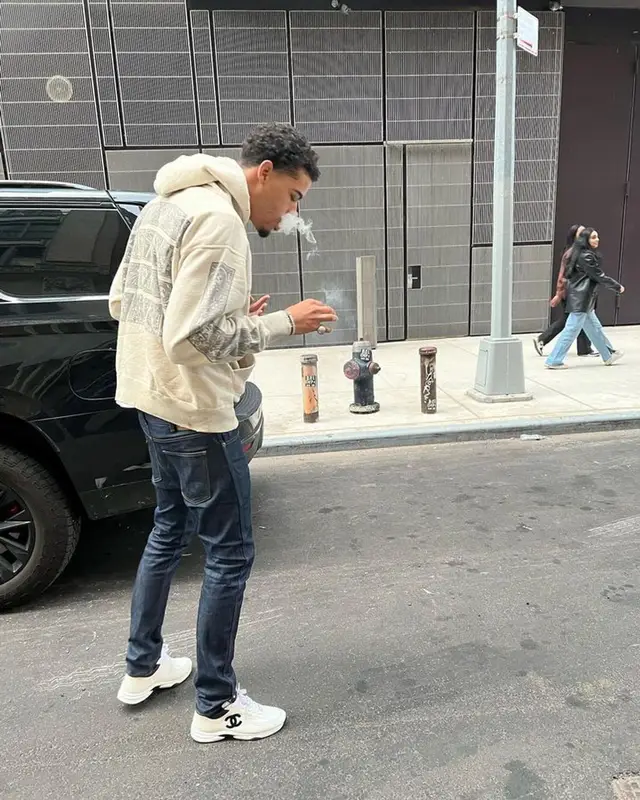 Jay Critch outfit in Denim Tears, Celine, and Chanel, 2023