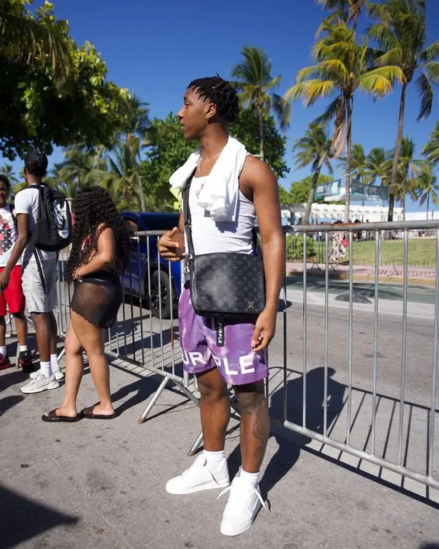 Badkid Jay outfit in Purple Brand and Louis Vuitton, 2023