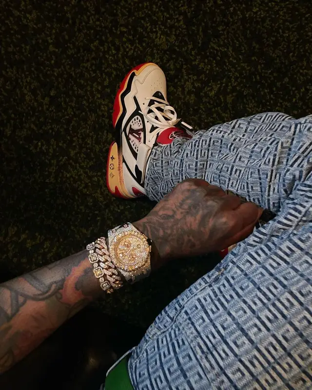 KSupreme outfit in Louis Vuitton, Givenchy, and Bottega Veneta, 2023