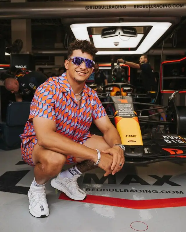Patrick Mahomes II outfit in Louis Vuitton, Oakley, and Versace, 2023