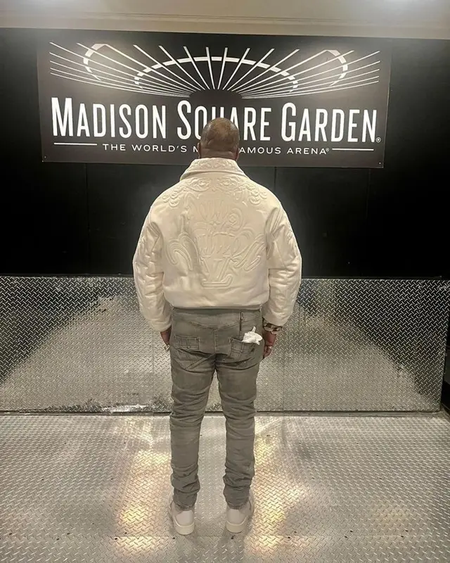 Busta Rhymes outfit in Louis Vuitton, Loewe, and Purple Brand, 2023
