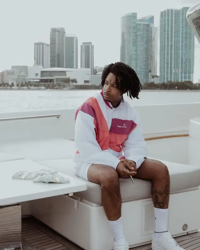 21 Savage outfit in Sergio Tacchini, Nike, and Kith, 2023