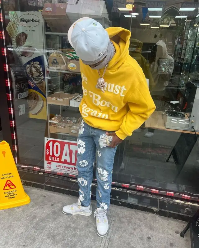 Lil Tjay outfit in Cactus Plant Flea Market, Levi’s, and Nike, 2023