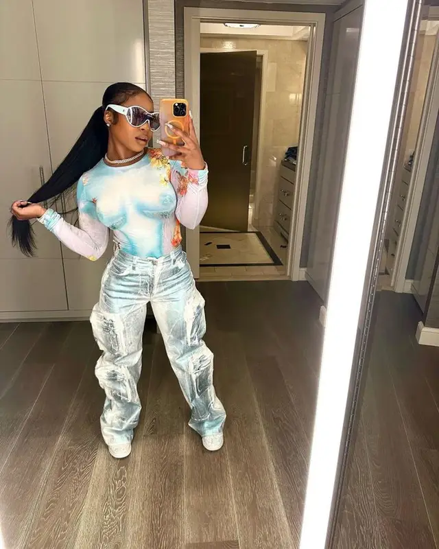 Reginae Carter outfit in Jean Paul Gaultier, Nike, and Chanel, 2023