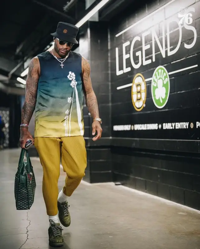 PJ Tucker outfit in Jil Sander, Issey Miyake, and Goyard, 2023