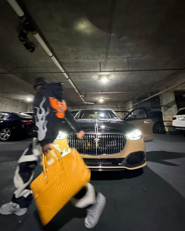 Bloody Osiris outfit in Loewe, Goyard, and Balenciaga, 2023