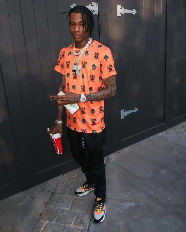 Soulja Boy outfit in Soulja Boy Merch, Purple Brand, and Dior, 2023