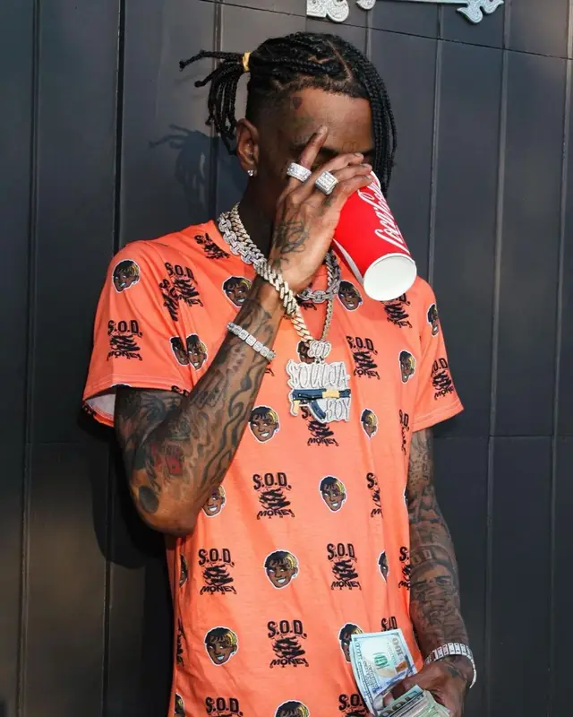 Soulja Boy outfit in Soulja Boy Merch, Purple Brand, and Dior, 2023
