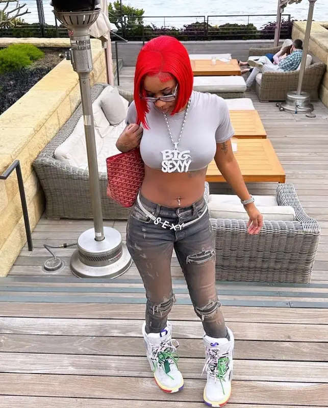 Sexyy Red outfit in Amiri, Goyard, and Ray-Ban, 2023