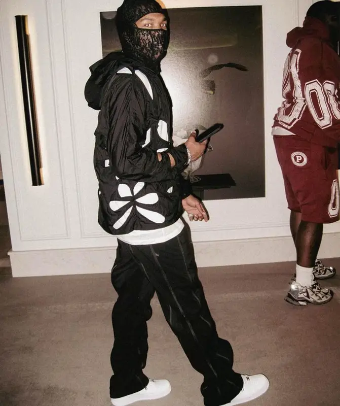 Lil Baby outfit in Post Archive Faction and Nike, 2023