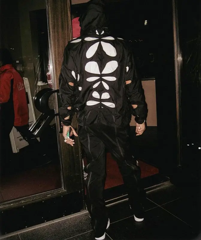 Lil Baby outfit in Post Archive Faction and Nike, 2023