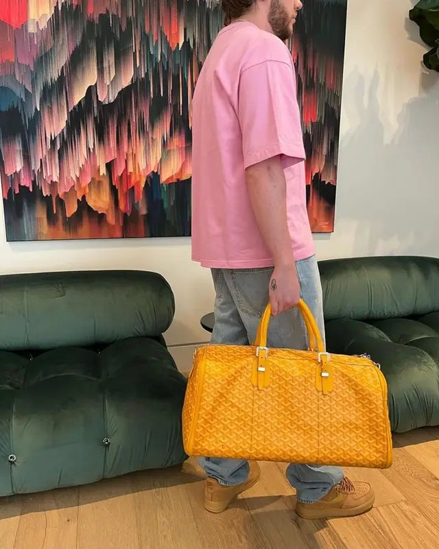 Murda Beatz outfit in Bottega Veneta, Nike, and Goyard, 2023