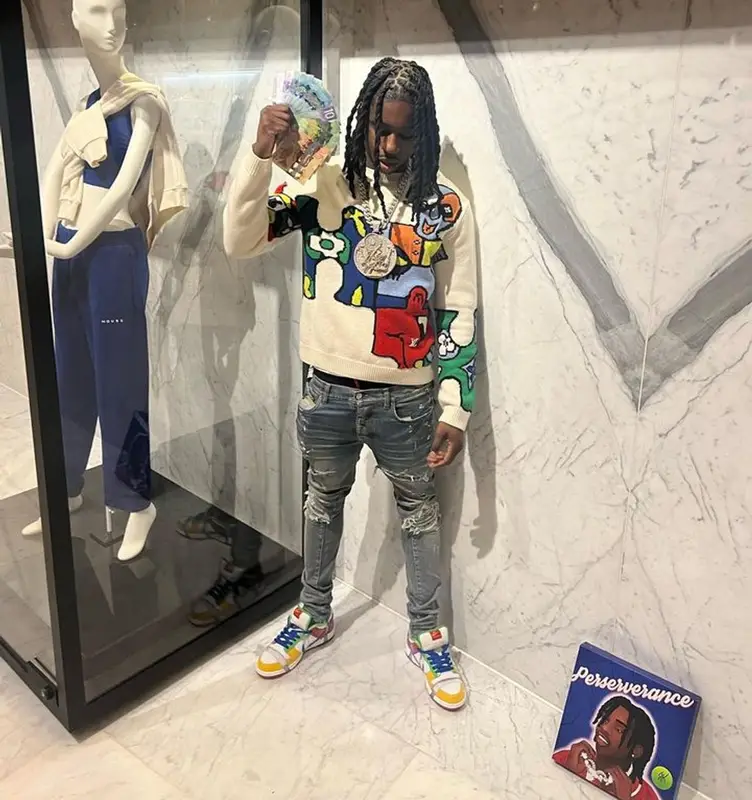 Polo G outfit in Louis Vuitton, Amiri, and Nike, 2023