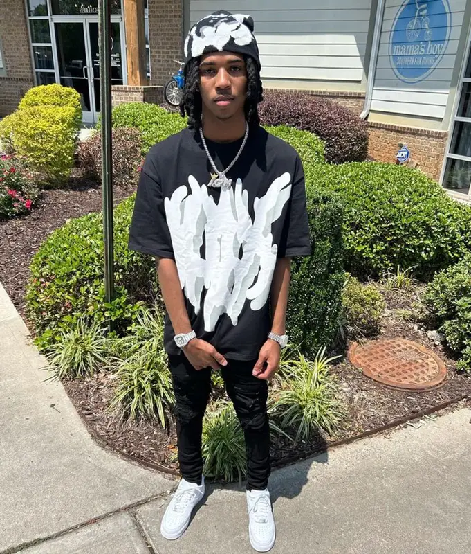 Lil Darius outfit in Amiri, Nike, and Noxinus, 2023