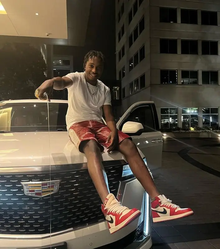 Lil Tjay outfit in Hanes, Who Decides War, and Nike, 2023