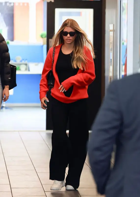 Sofia Richie outfit in The Row, Chanel, and Saint Laurent, 2023