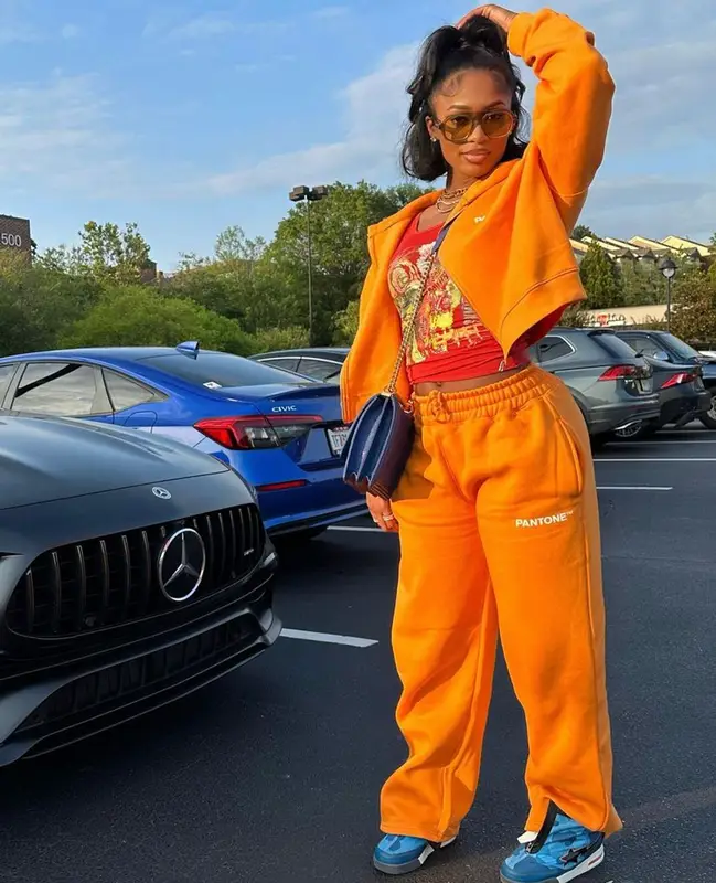 Dess Dior outfit in BooHoo, A Bathing Ape, and Chanel, 2023