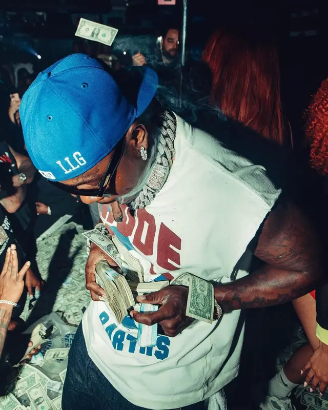DaBaby outfit in Rhude, Bottega Veneta, and New Era, 2023