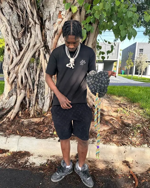 Lil Tjay outfit in Louis Vuitton, 2023