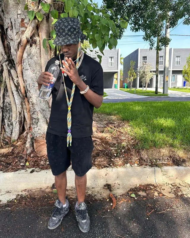 Lil Tjay outfit in Louis Vuitton, 2023