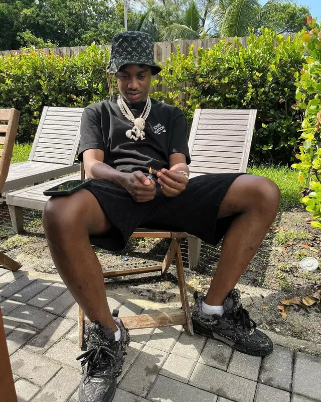 Lil Tjay outfit in Louis Vuitton, 2023