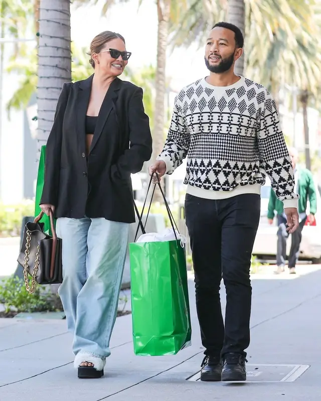 Chrissy Teigen outfit in R13, Bottega Veneta, and Marni, 2023
