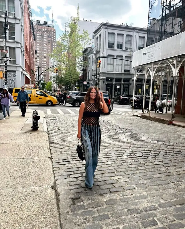 Chrissy Teigen outfit in Dries Van Noten, Agolde, and Bottega Veneta, 2023
