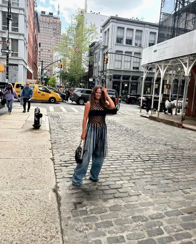 Chrissy Teigen outfit in Dries Van Noten, Agolde, and Bottega Veneta, 2023