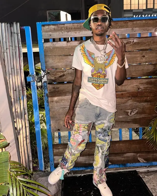 Lil Tjay outfit in Made Worn, Nike, and Louis Vuitton, 2023