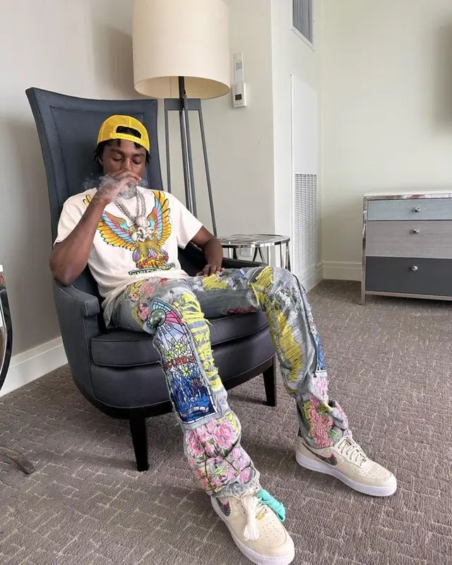 Lil Tjay outfit in Made Worn, Nike, and Louis Vuitton, 2023
