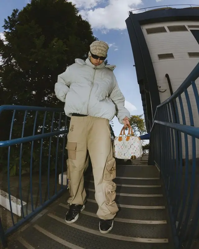 Ryu the Runner outfit in Louis Vuitton, Supreme, and Takashi Murakami, 2023